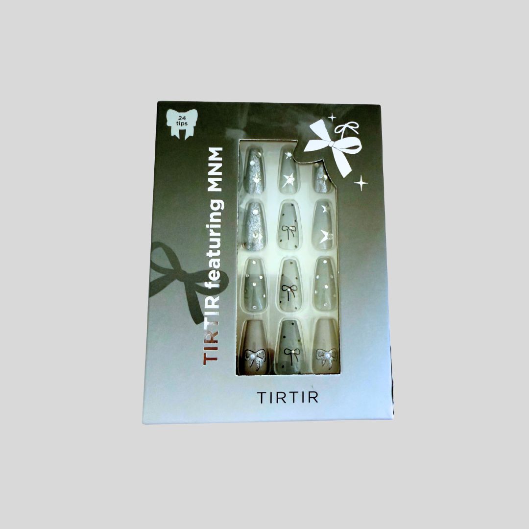 uñas con moñito gris