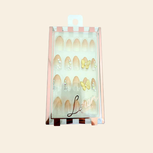 Uñas mariposa dorada